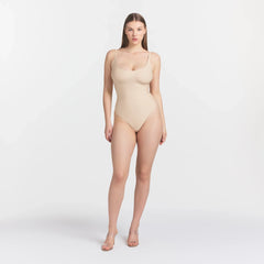 SKIMS BODY SCOOP LOW BACK THONG BODYSUIT | SAND