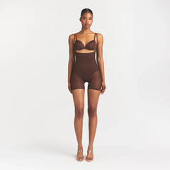 SKIMS BODY CORE SCULPT BACK SMOOTHING OPEN BUST MID THIGH BODYSUIT | COCOA