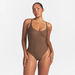 SKIMS BODY SCOOP LOW BACK THONG BODYSUIT | JASPER