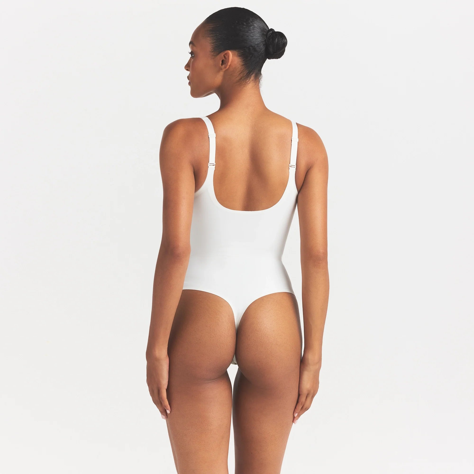 SKIMS BODY UNLINED PLUNGE THONG BODYSUIT | IVORY