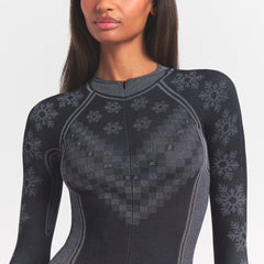 SKIMS FIRST LAYERS HALF ZIP ONESIE | OBSIDIAN WINTER FAIR ISLE
