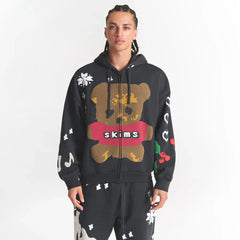 CACTUS PLANT FLEA MARKET X SKIMS HEAVYWEIGHT FLEECE MENS RELAXED ZIP UP HOODIE | ONYX TEDDY BEAR PRINT